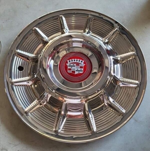 Four 57 cadillac hubcaps Recently re-polished .Brand new cadillac emblems. - Image 3