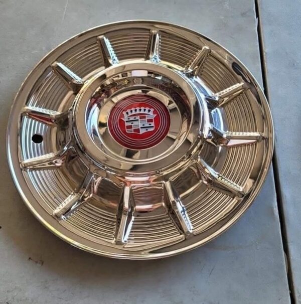 Four 57 cadillac hubcaps Recently re-polished .Brand new cadillac emblems. - Image 2