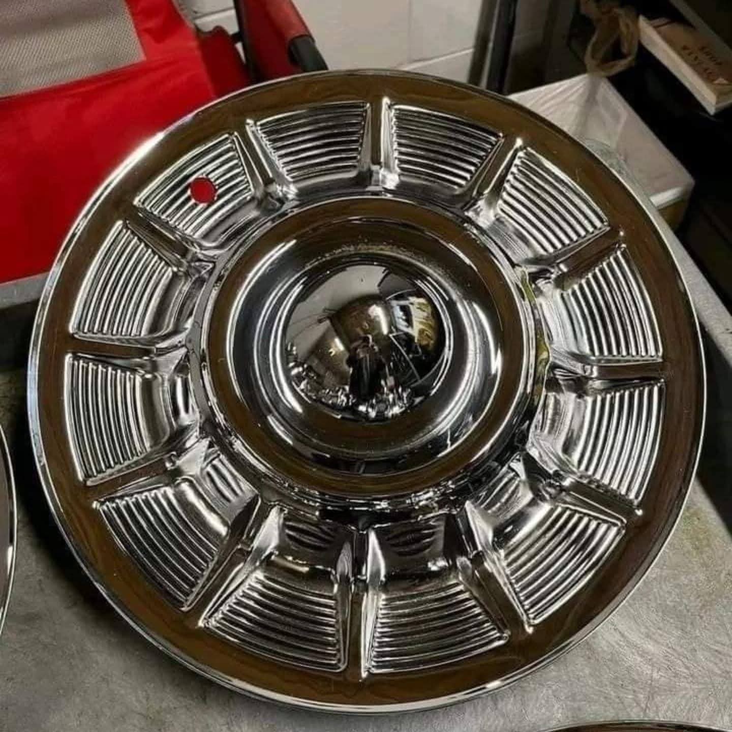 1957 Cadillac hubcaps all chrome